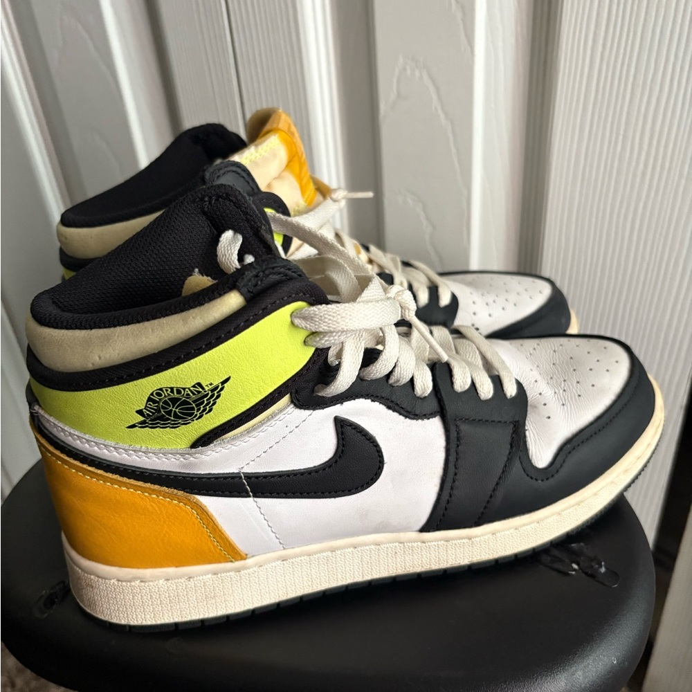 Nike Air Jordan Retro High in Black, White, and Yellow